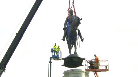 Robert E. Lee statue is removed from Monument Avenue in Richmond