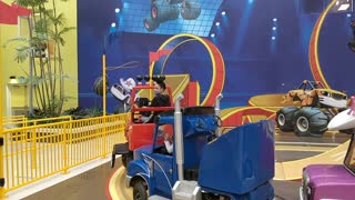 Spencer driving a truck at Nickelodeon Universe - VID_20201011_110550