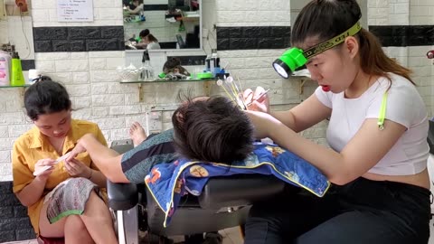Relaxing paradise at Vietnam barbershop: haircut, facial shave, ear wax, nail cleaning, head massage