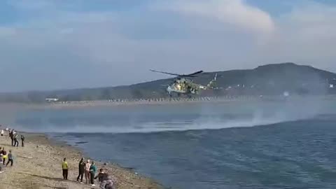 Russian MI24 pilot, showing his skills in front of People