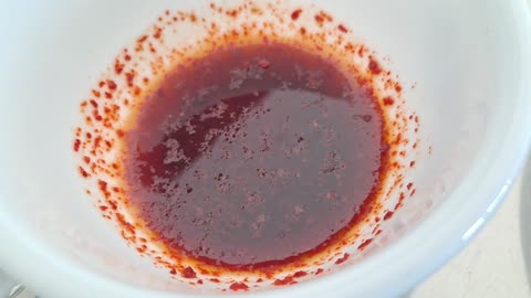 Red pepper powder in soy sauce.