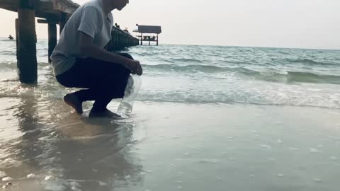 Water Bottle flip at beach