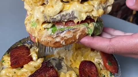 The MASSIVE CHORIZO BIG MAC & CHEESE BURGER from Flip N Toss in the West Village!