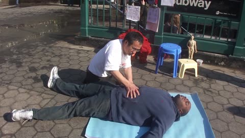 Luodong Massages Black Man And Talks To Crowd