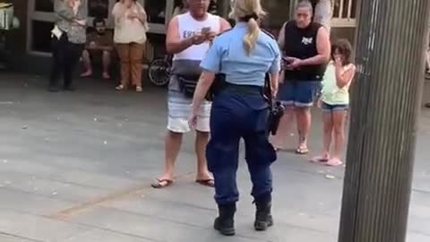 Sydney Australia Police officer swears Infront of a man's child and then pepper spray him