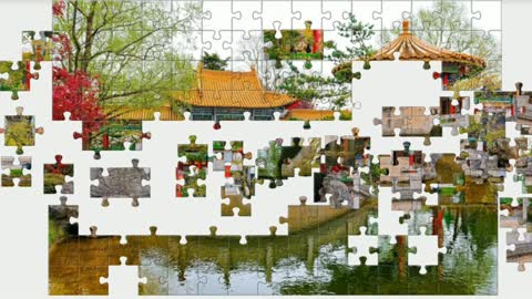 Puzzle. Red bridge across the lake. China.
