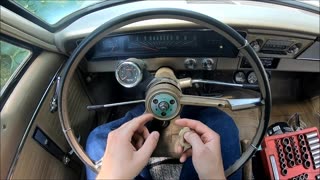 Removing a steering wheel on a 60's GM vehicle.