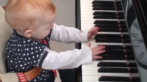 Amazing one year old child plays a piano concert so amazing and wonderful
