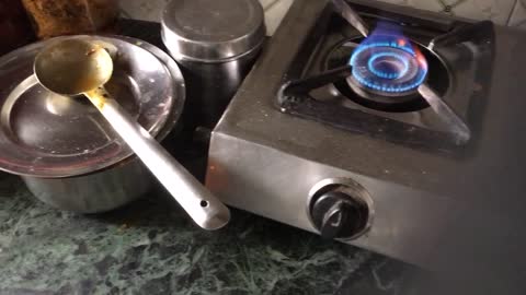 Bachelor preparing tea in india