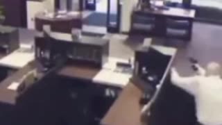 Bank robber is welcomed with open firearms