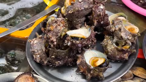 Korean Seafood Adventure: Trying Unique Snails and Giant Oysters