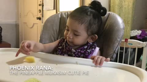 Baby Tastes Pineapple for the First Time with a Cute Face