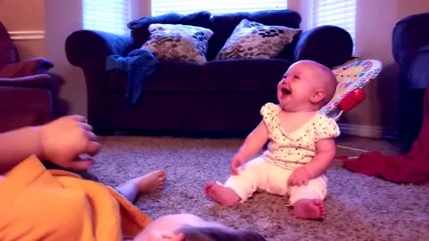 Baby Laughing Hysterically at Siblings