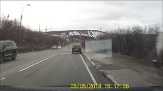 Car Chase Lands Police Car in Ditch