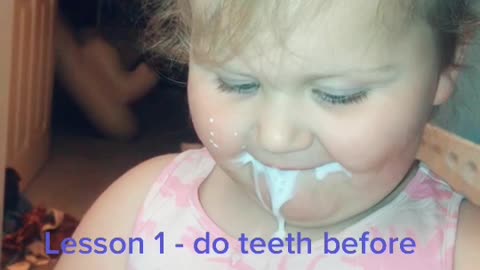 Little Girl Uses an Electric Toothbrush for the First Time