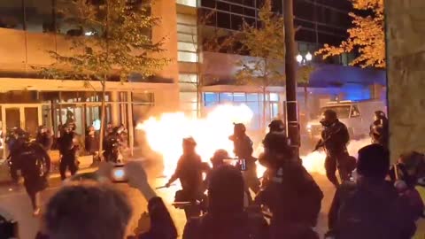 BLM Antifa throw Molotov cocktail at police