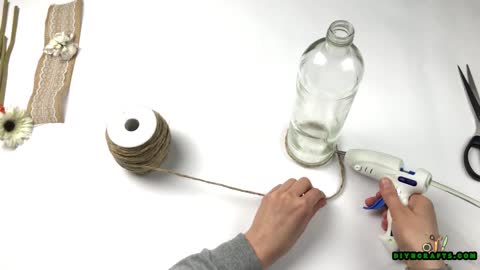 How to Upcycle an Empty Bottle Into a Gorgeous Homespun Vase - DIYnCrafts.com