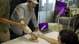 This prosthetic helps amputees feel the warmth of human touch