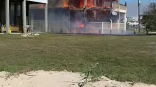 Close up of house on fire
