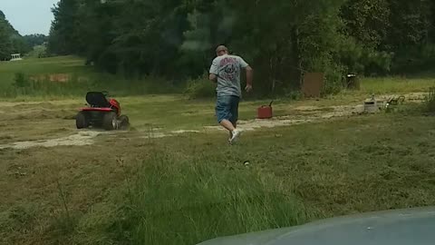 Son Plays Practical Joke On Dad Making Him Jump Off A Lawnmower