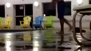 Blue shorts indoor pool big belly flop