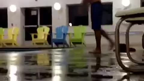 Blue shorts indoor pool big belly flop