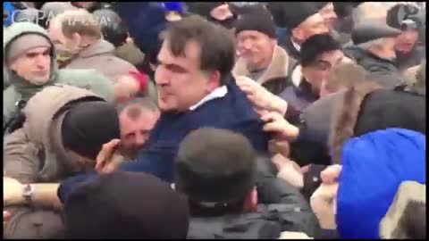 Moment ex-Georgian president freed after dramatic standoff in Kiev