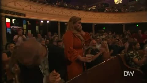 Gina Carano Bursts Into Tears as Conservative Audience Gives Her a Standing Ovation