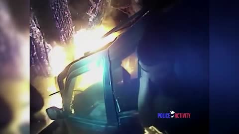 Bodycam Shows Cop Save Man Trapped in Burning Car