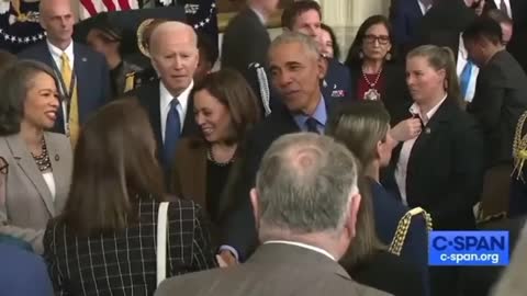 Biden is lost in a crowd and Obama totally ignores him