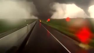 This was a close encounter with a pair of tornadoes in Nebraska