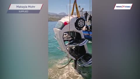 US tourist's rental car takes a dip in Hermanus Harbour, lifted out by crane