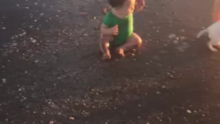 Babies first steps at beach