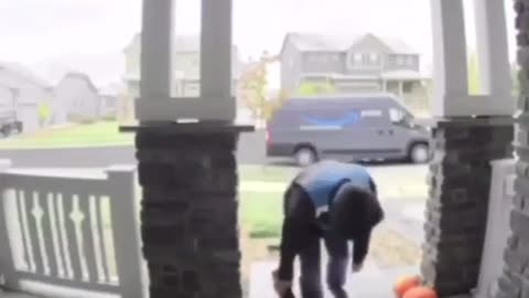 Amazon delivery driver takes a real nasty spill not once but twice!