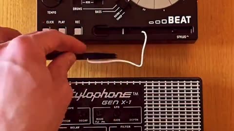 THE STYLOPHONE IS A MINIATURE ANALOG ELECTRONIC KEYBOARD INSTRUMENT PLAYED WITH A STYLUS~INVENTED IN 1967 BY BRIAN JARVIS