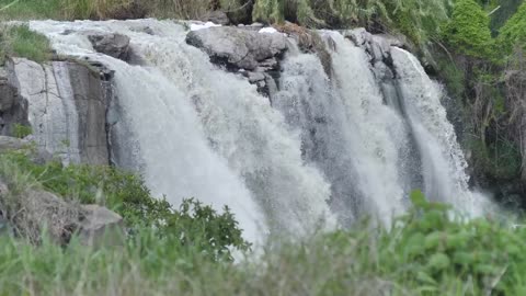 Rocky waterfall on a river in nature