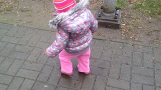 Baby loves stomping in puddles