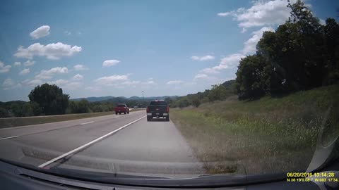 Reckless Driver Changing Lanes Causes A Car to Flip Off Road
