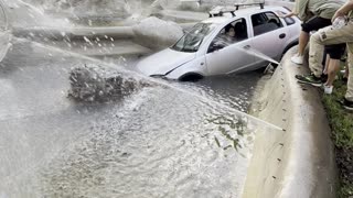 Woman Drives Her Car Into a Fountain