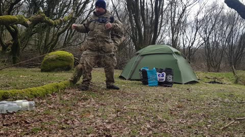 Putting my pack on to take to the car. Dartmoor. 26th March 2023