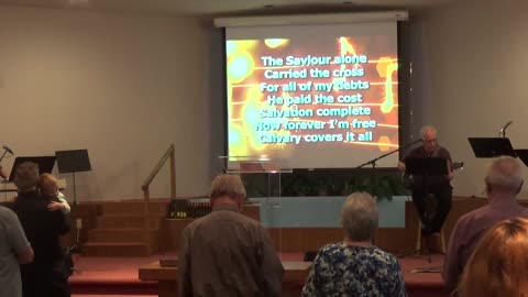 Grampy and Jesse in church worshipping.