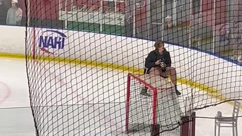 Student Deftly Dodges Hockey Puck