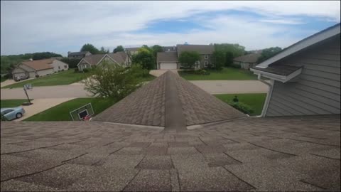 Shot Basketball Over The House Roof