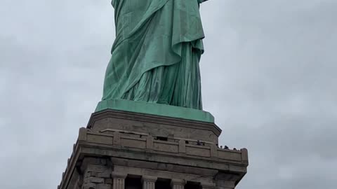 Bus trip to the Statue of Liberty. - Manhattan skyline