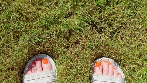 Walking feet POV - At the park public feet