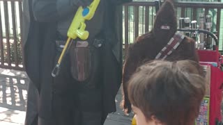 Houston superhero party character vader teaches longlings to catch the wookie with the net launcher