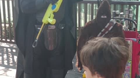 Houston superhero party character vader teaches longlings to catch the wookie with the net launcher