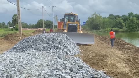 New bulldozer spreading gravel processing features building road foundation-12