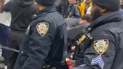 Illegal Migrants Attack NYPD Cops Making Arrest at NYC Migrant Shelter