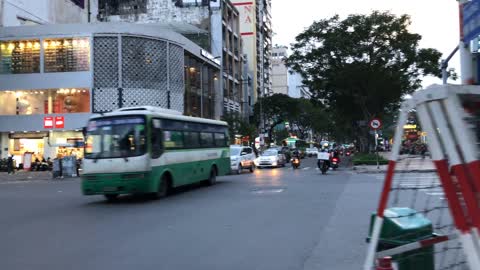 Vietnam walking tour - Scenery of Ho Chi Minh City crowded with motorbikes